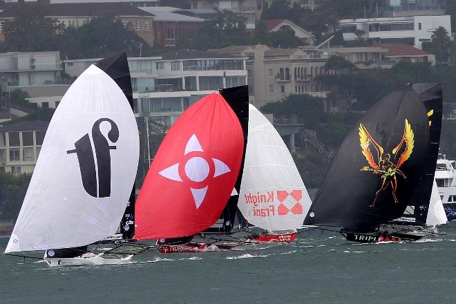 Thurlow Fisher leads Noakesailing, Knight Frank and Triple M after rounding the windward mark - JJ Giltinan 18ft Skiff Championship © Frank Quealey /Australian 18 Footers League http://www.18footers.com.au